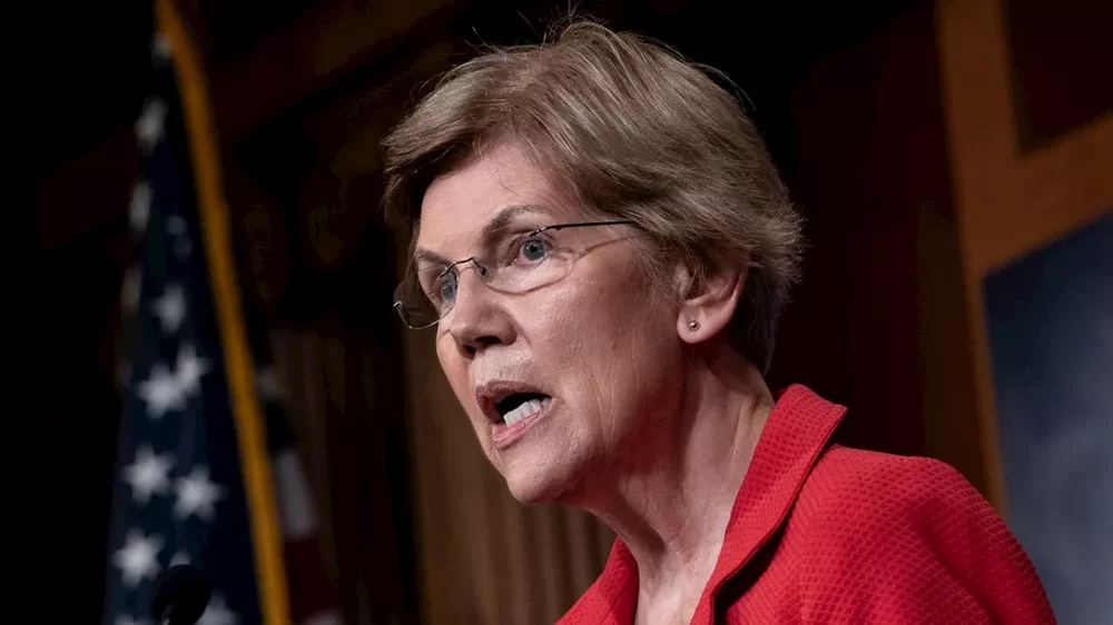 sen-elizabeth-warren-sides-with-trump-s-call-to-el-sen-elizabeth-warren-sides-with-trump-s-call-to-el-822E3CE37C0A8AD42445DCC0898B2097-435968895.webp